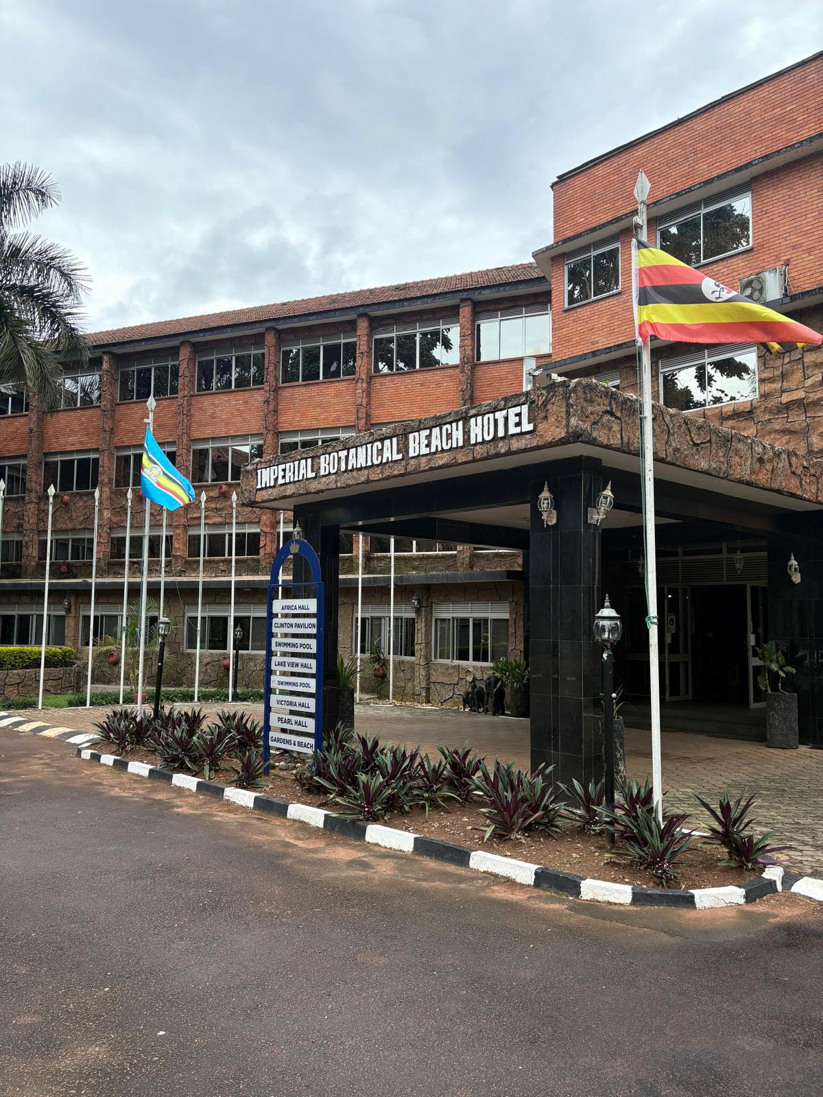 The entrance of the Imperial Botanical Beach Hotel in Entebbe, with the Ugandan flag flying